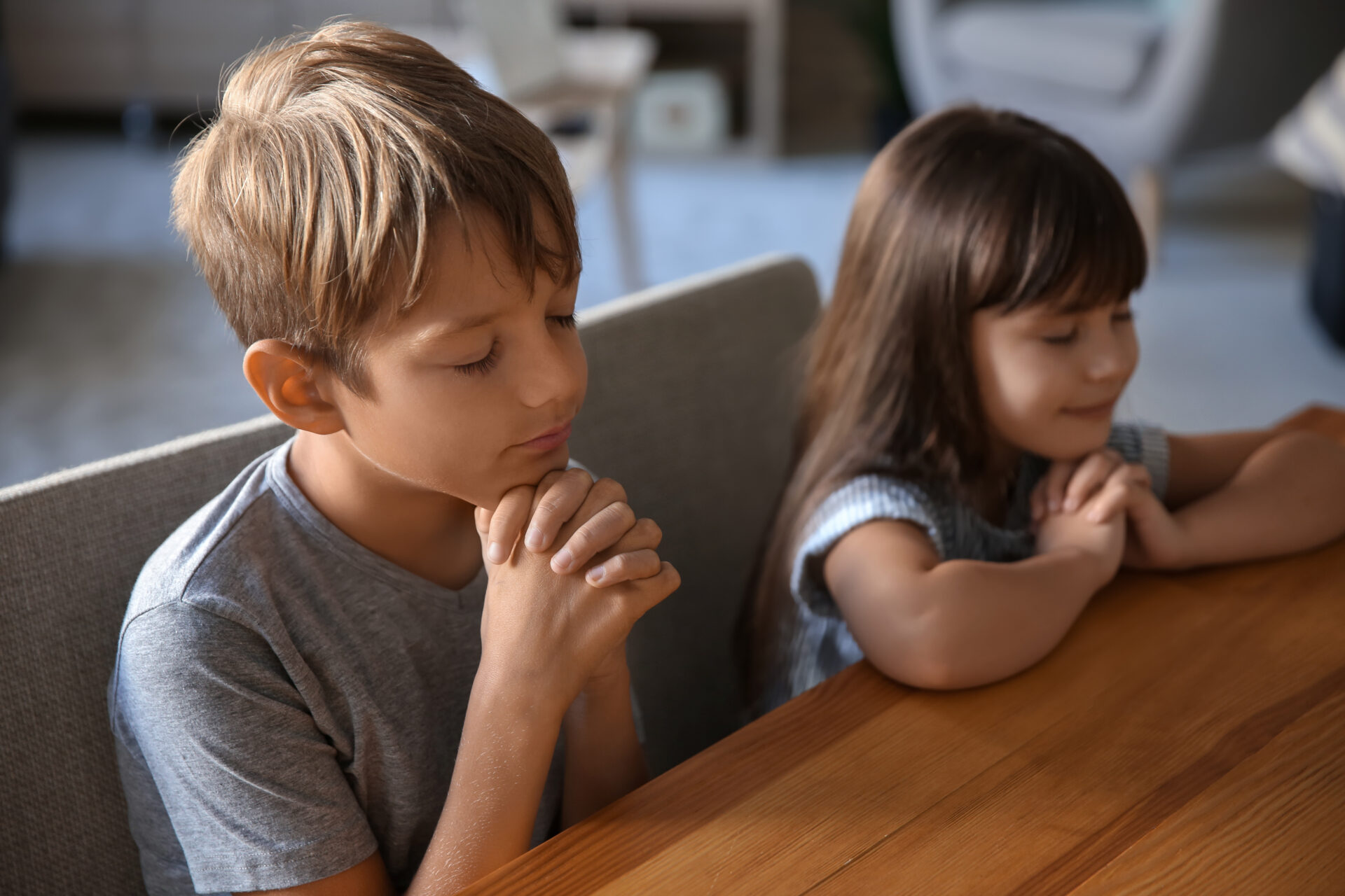 Cute Children Praying At Home