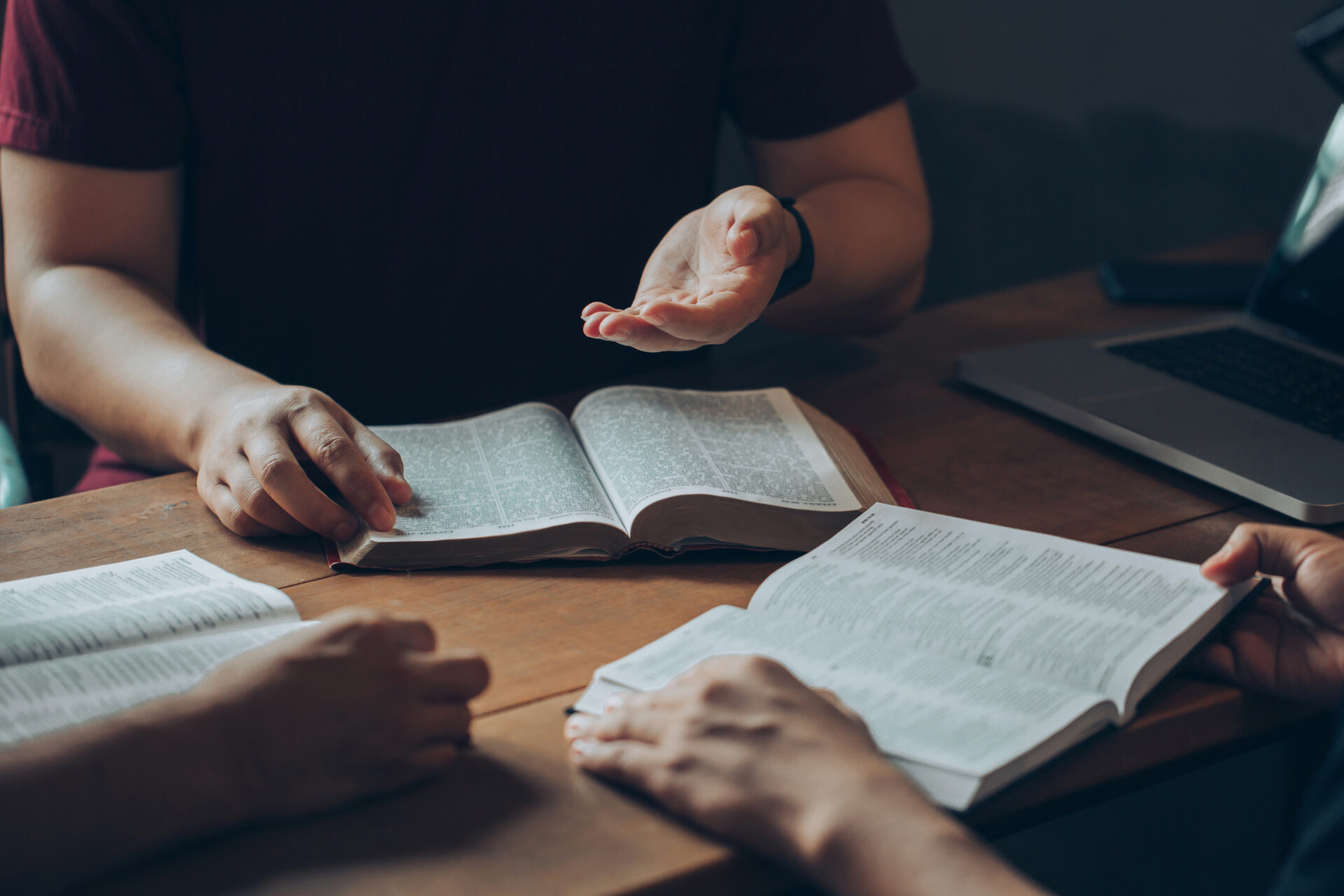 Christian Bible Study Concepts. Christian Friend's Groups Read And Study The Bible Together In A Home With Window Light. Followers Are Studying The Word Of God In Churches.
